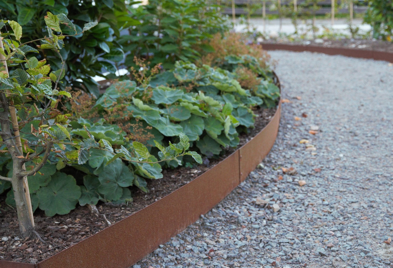 Planteringskant Cortenstål Kvartsbåge 500x120 - Stenbolaget